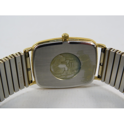 133 - Gents Gold tone Omega DeVille quartz wristwatch with stainless steel expanding strap, will require n... 