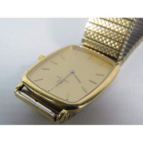 133 - Gents Gold tone Omega DeVille quartz wristwatch with stainless steel expanding strap, will require n... 