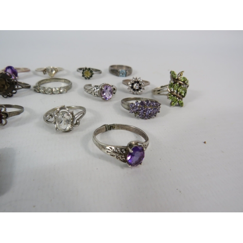 134 - Fourteen 925 silver rings set with various stones, a 9ct back and front locket and three ladies wris... 