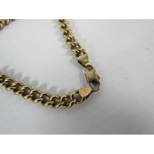 140 - 9ct Gold chunky curb link bracelet, 20 cm long. 7.9 grams