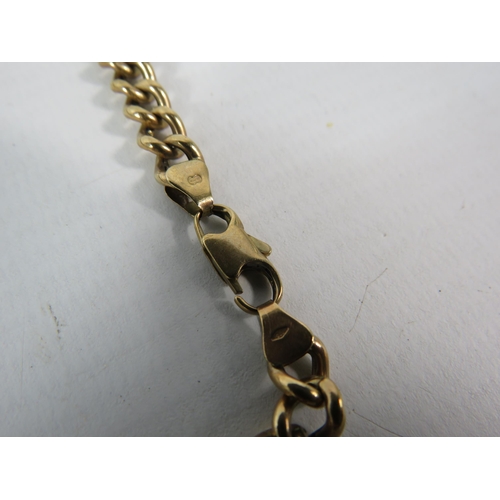 140 - 9ct Gold chunky curb link bracelet, 20 cm long. 7.9 grams