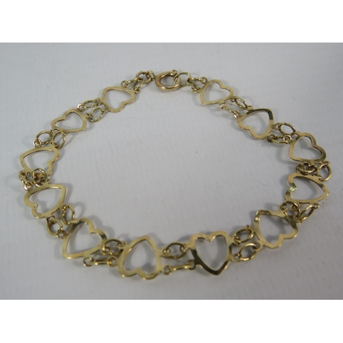 144 - 9ct Gold heart link bracelet, 18.5cm long. 2.9 grams.