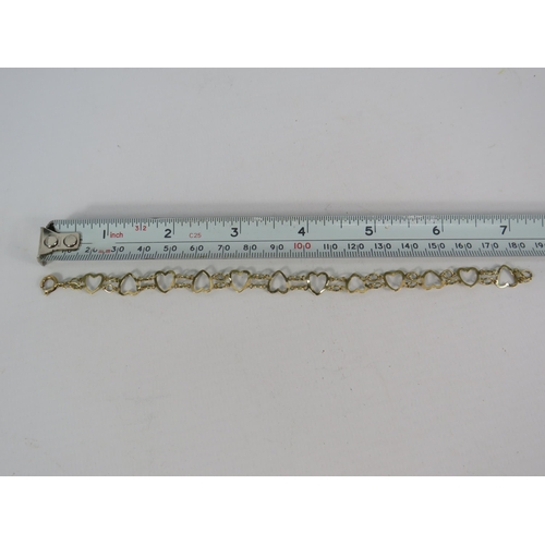 144 - 9ct Gold heart link bracelet, 18.5cm long. 2.9 grams.