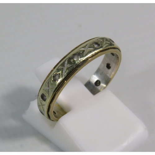 147 - 9ct Yellow and white Gold Eternity ring set with paste stones, 3.1 grams.