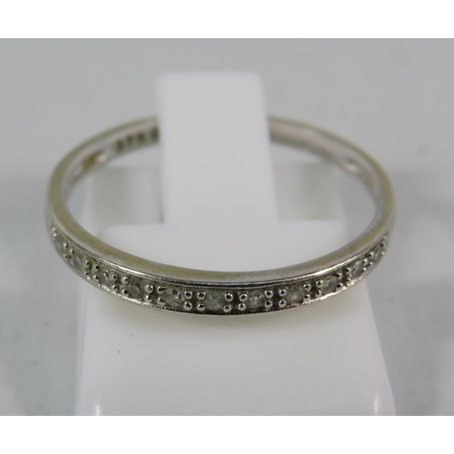 148 - 9ct White Gold and diamond half eternity ring, Finger size 