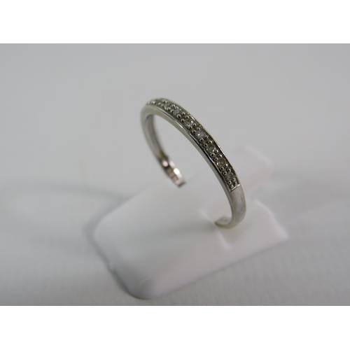 148 - 9ct White Gold and diamond half eternity ring, Finger size 