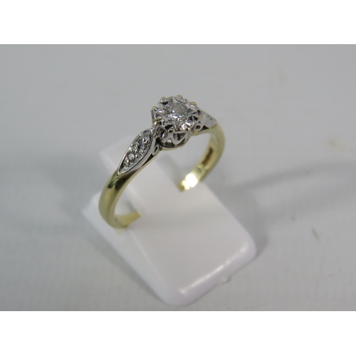 150 - 9ct Gold 10pt Diamond set solitaire ring with two small diamonds set to each shoulder, finger size 