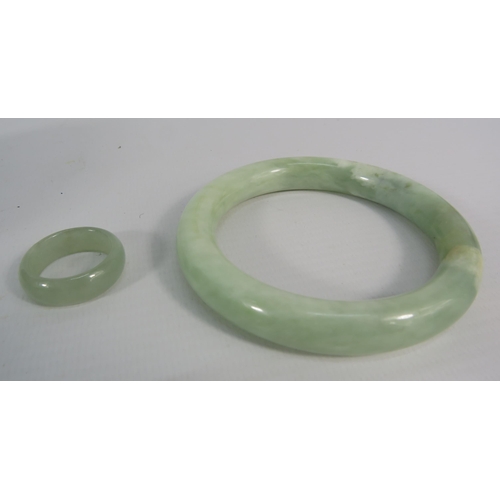 161 - Vintage natural solid Jade bangle and a Jade ring, finger size T.