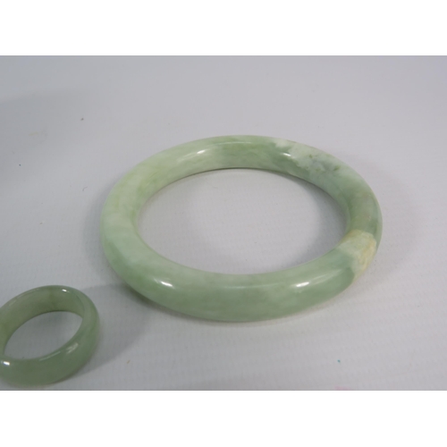 161 - Vintage natural solid Jade bangle and a Jade ring, finger size T.