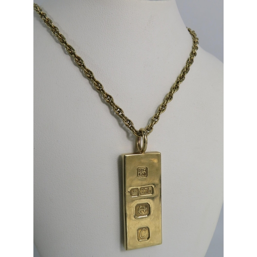 163 - 9ct Solid Gold Ingot on a 22