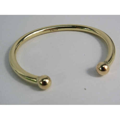 165 - 9ct solid Gold Torque bracelet, 35 grams.