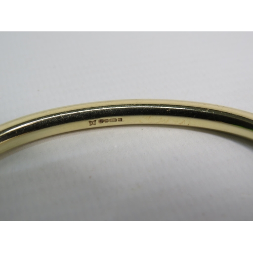 165 - 9ct solid Gold Torque bracelet, 35 grams.