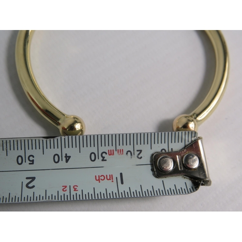 165 - 9ct solid Gold Torque bracelet, 35 grams.