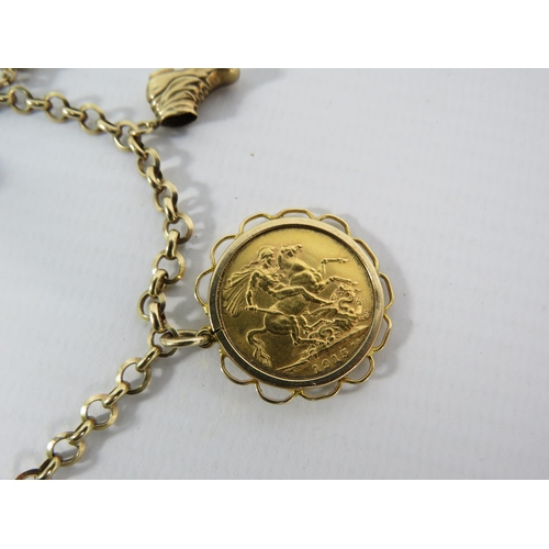 170 - 9ct gold charm bracelet with Seven charms and a 1915 mounted full sovereign. 9.2 grams of 9ct and 8 ... 