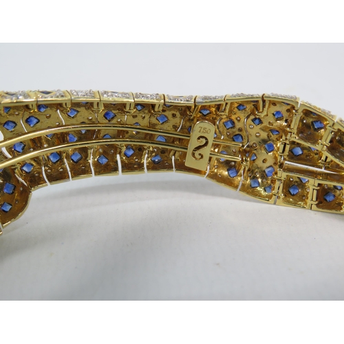 171 - 18ct gold articulating panther bracelet / brooch set with 1.34 cts of Diamonds, 4.84cts of Sapphires... 