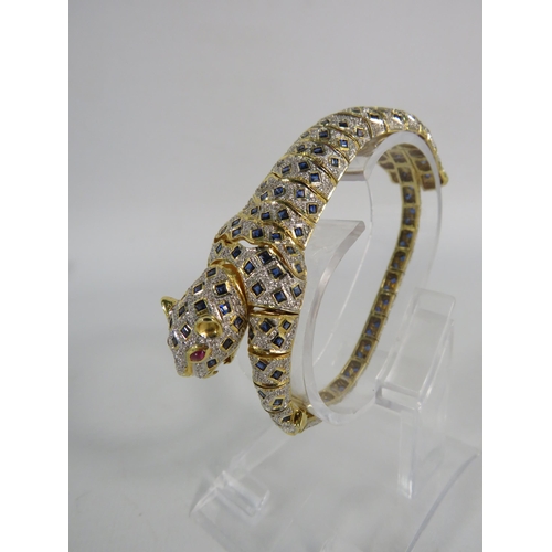 171 - 18ct gold articulating panther bracelet / brooch set with 1.34 cts of Diamonds, 4.84cts of Sapphires... 