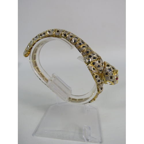 171 - 18ct gold articulating panther bracelet / brooch set with 1.34 cts of Diamonds, 4.84cts of Sapphires... 