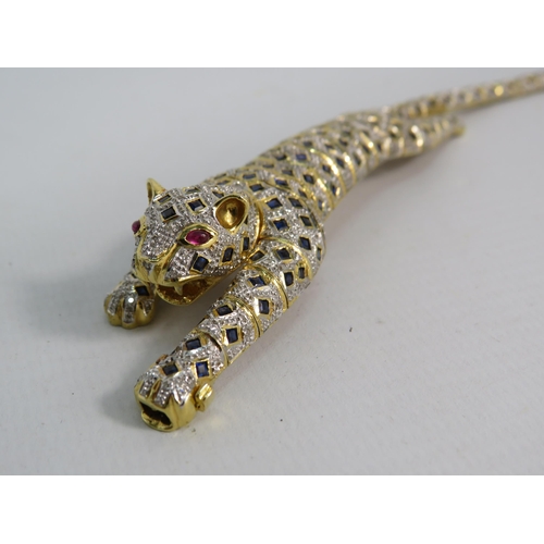 171 - 18ct gold articulating panther bracelet / brooch set with 1.34 cts of Diamonds, 4.84cts of Sapphires... 