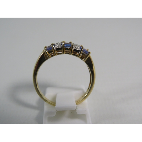 173 - 9ct Yellow Gold Tanzanite and Moissanite ring, Finger size 