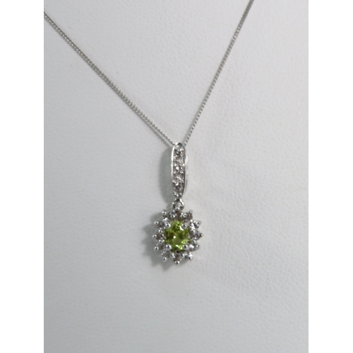 176 - 9ct White gold Chrysoberyl and White Topaz Pendant on a 9ct gold trace chain, 2.1 grams.