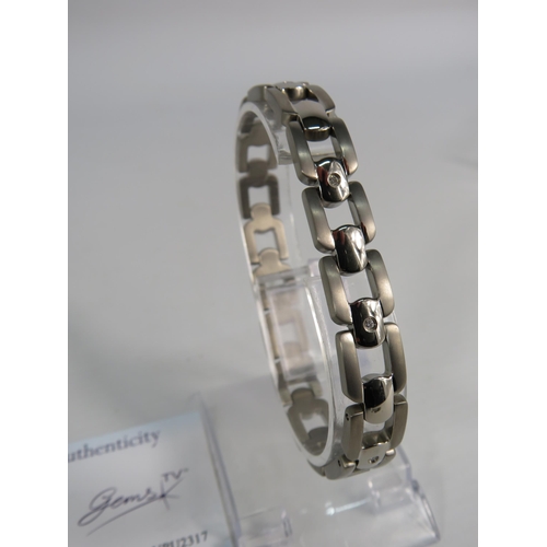 186 - Diamond set Titanium bracelet.