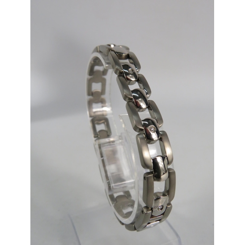 186 - Diamond set Titanium bracelet.