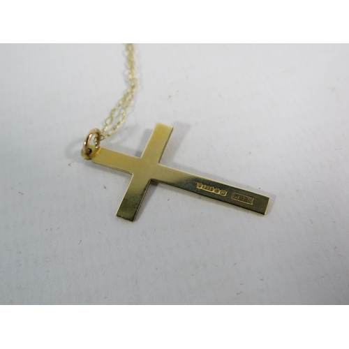 190 - 9ct Yellow Gold Crucifix and trace chain, 1.4 grams.