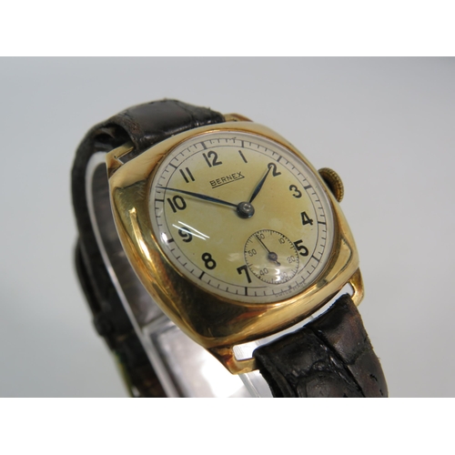 193 - Vintage 1940s Bernex 9ct gold mechanical wristwatch with leather strap in running order.