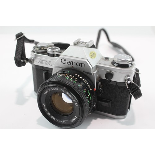 509 - Canon AE-1 SLR Vintage Film Camera Working w/ Canon FD 50mm F/1.8 Lens 381326