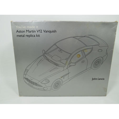 801 - Die Cast Model Kit of a 2002 Aston Martin V12 Vanquish which appears to be complete and in original ... 