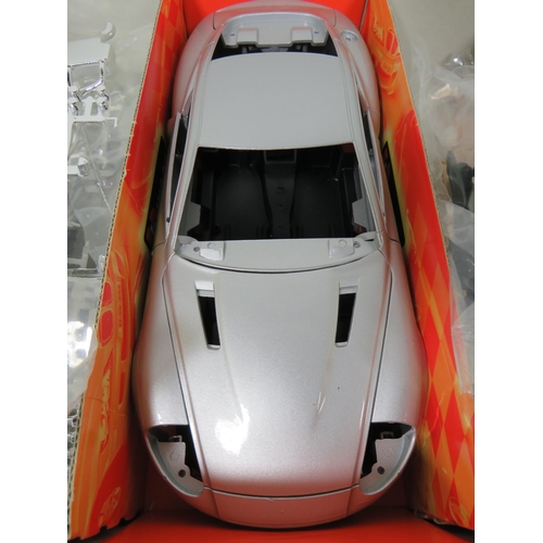 801 - Die Cast Model Kit of a 2002 Aston Martin V12 Vanquish which appears to be complete and in original ... 