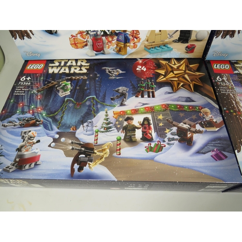 811 - Four Lego Star Wars Advent Calendars which are Boxed and Unopened.  See photos