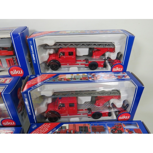 812 - Seven Siku 1:50 Scale Die Cast Scale Models of Fire Trucks plus two by Corgi classics . All in boxed... 