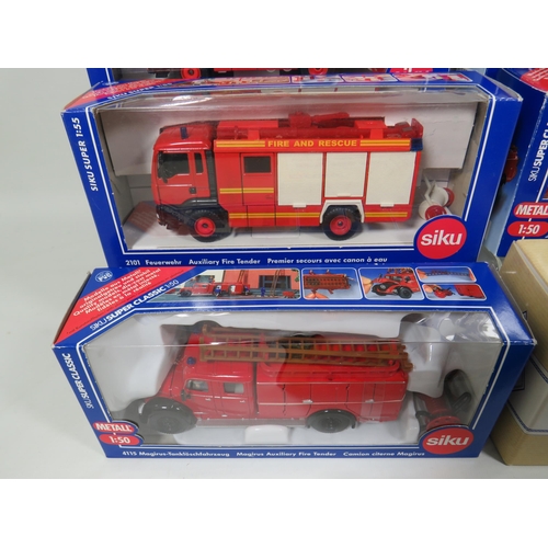 812 - Seven Siku 1:50 Scale Die Cast Scale Models of Fire Trucks plus two by Corgi classics . All in boxed... 