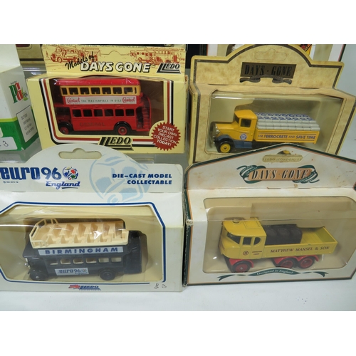 825 - Sixteen Die Cast Model Vehicles  .   All boxed and in unused condition.  See photos for details.