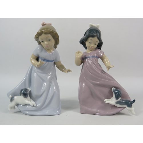 304 - Two Nao figurines of young girls with dogs, 6.5