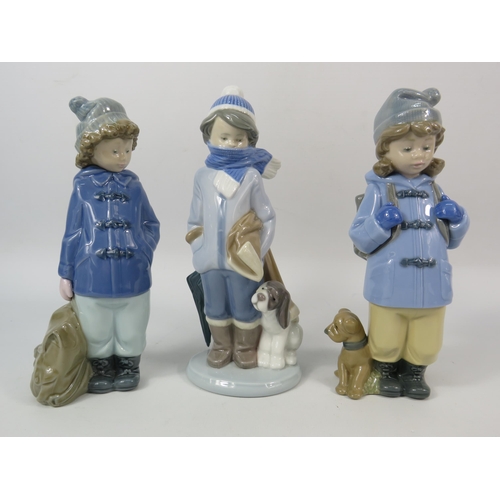 305 - Two Nao and one Lladro figurines of young boys, the tallest measures 8