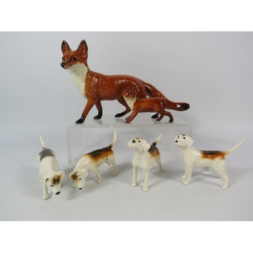 311 - Large Beswick Fox, Small Beswick fox and four hounds.