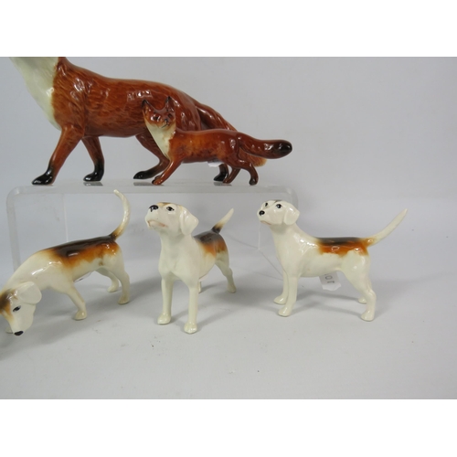 311 - Large Beswick Fox, Small Beswick fox and four hounds.