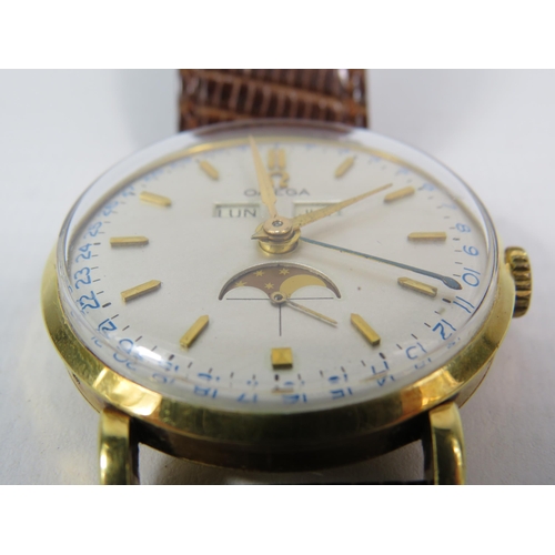 313 - 1944 Omega Cosmic triple date moonphase 18ct gold gents wristwatch, with receipts from 1989. Case No... 