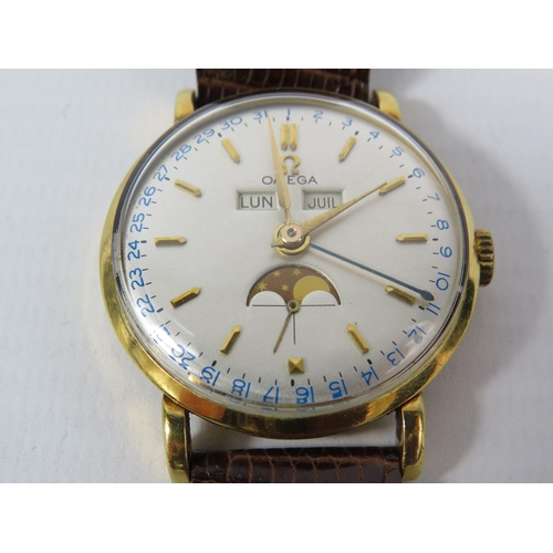 313 - 1944 Omega Cosmic triple date moonphase 18ct gold gents wristwatch, with receipts from 1989. Case No... 