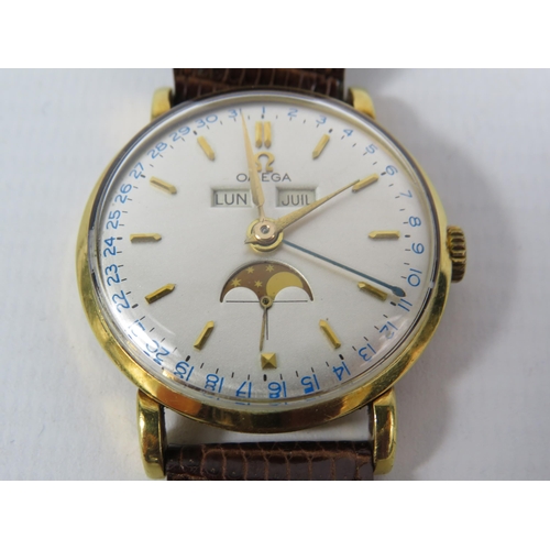 313 - 1944 Omega Cosmic triple date moonphase 18ct gold gents wristwatch, with receipts from 1989. Case No... 