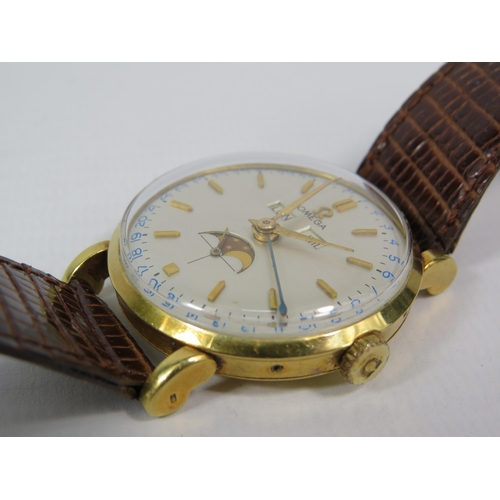 313 - 1944 Omega Cosmic triple date moonphase 18ct gold gents wristwatch, with receipts from 1989. Case No... 