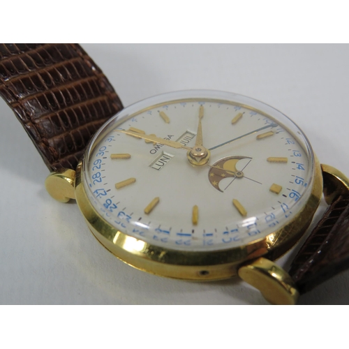 313 - 1944 Omega Cosmic triple date moonphase 18ct gold gents wristwatch, with receipts from 1989. Case No... 