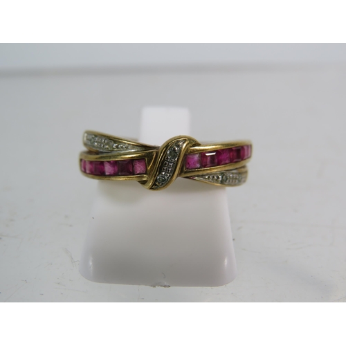 326 - 9ct Rose gold Ruby and diamond crossover ring, finger size 