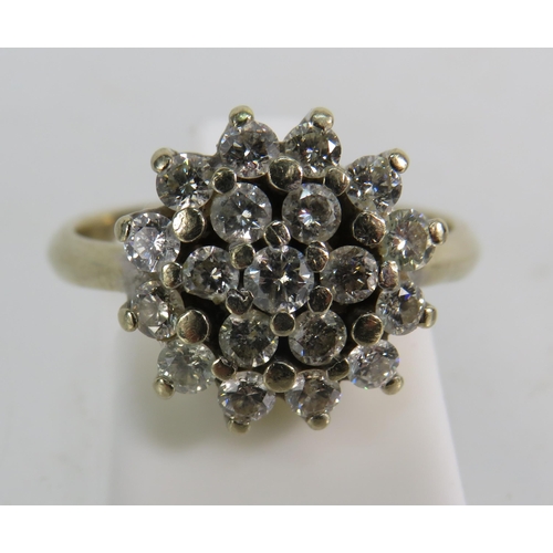 328 - 18ct Gold Diamond cluster ring (approx 3/4 cts of diamonds ) finger size 