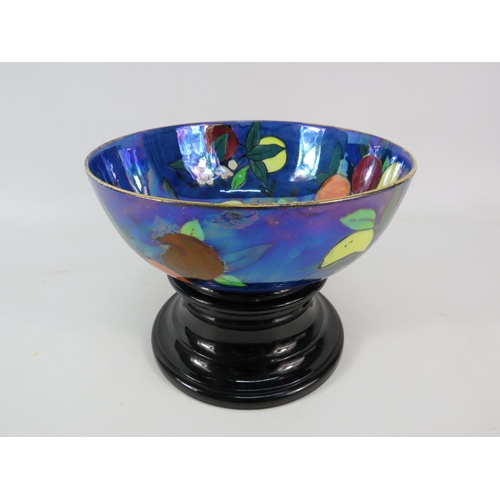 683 - Rare Carltonware orchard pattern lustre bowl with a vintage black glass pedestal stand, the bowl has... 