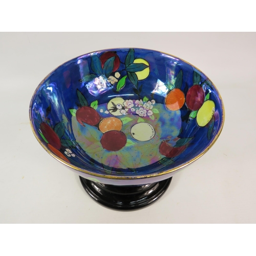 683 - Rare Carltonware orchard pattern lustre bowl with a vintage black glass pedestal stand, the bowl has... 