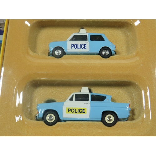 886 - Eight Vintage Die Cast Police Vehicles plus a boxed Double car Gift set. All boxed and unused. See p... 