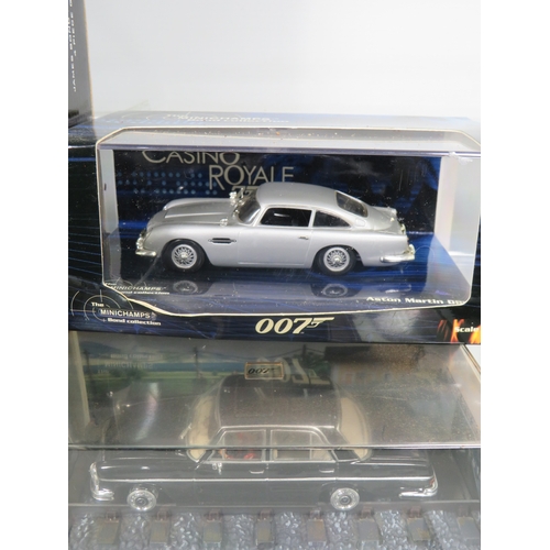 895 - Four Corgi 007 James Bond Film Vehicles all in perspex cases plus a 007 Film Vehicle Gift set. All b... 